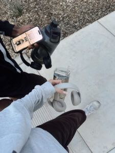 A person pausing thoughtfully during movement, representing the exploration of exercise patterns and body image through online therapy in Ontario